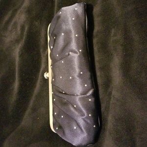 Beautuful navy clutch with sparkle detail